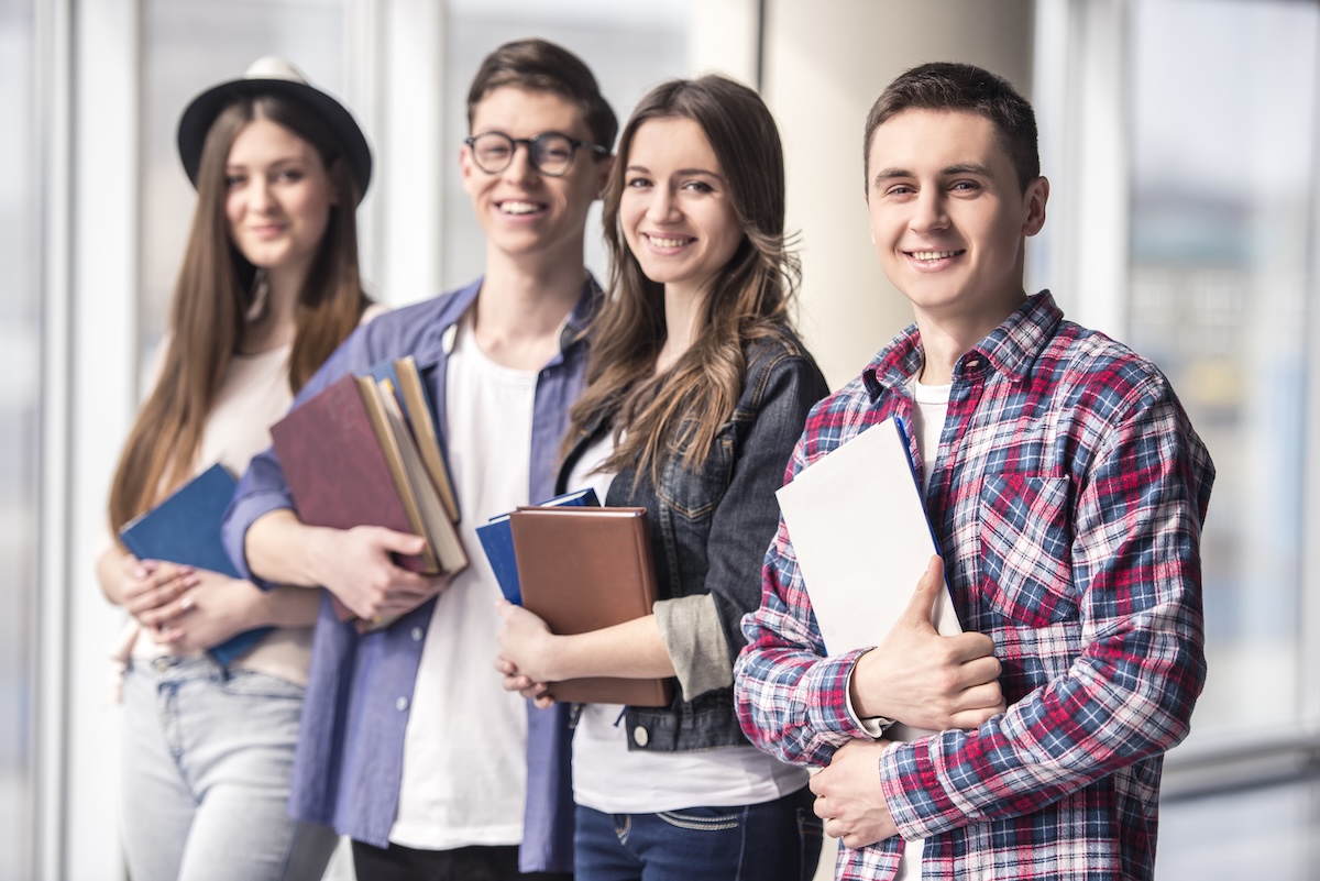 Group,Of,Happy,Young,Students,In,A,University.
